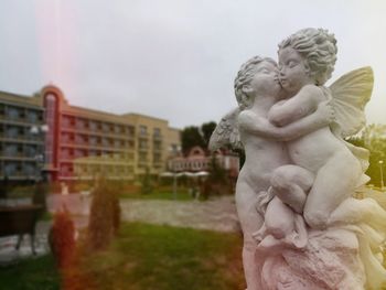 Close-up of statue against sky