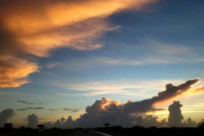 Low angle view of dramatic sky during sunset