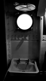 Reflection of illuminated lights in bathroom at home