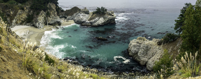 High angle view of rock formation at beach