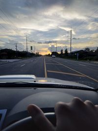 Road seen through car windshield