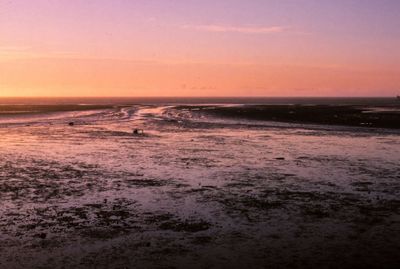 Scenic view of sea at sunset