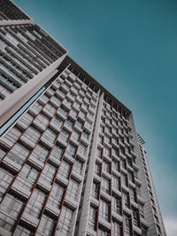 Low angle view of modern building against clear sky