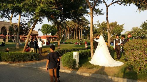 Panoramic view of people in park