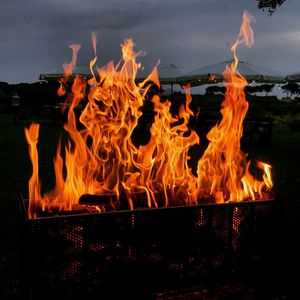 Close-up of fire against the sky