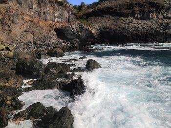 Scenic view of rocks in sea