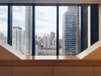 Buildings seen through window