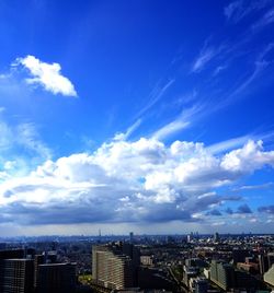 Cityscape against blue sky