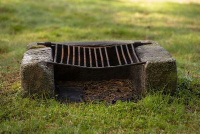 Close-up of old wood on field