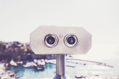 Close-up of camera against clear sky