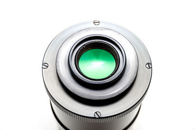 Close-up of camera against white background