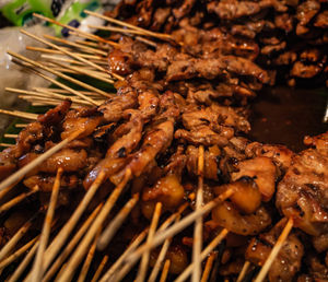 High angle view of meat on barbecue