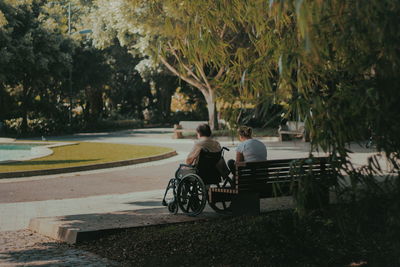 People sitting on road