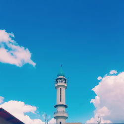 Low angle view of church against blue sky