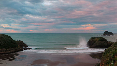 Scenic view of sea against sky during sunset