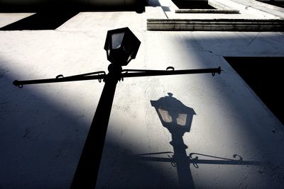 Low angle view of man on building