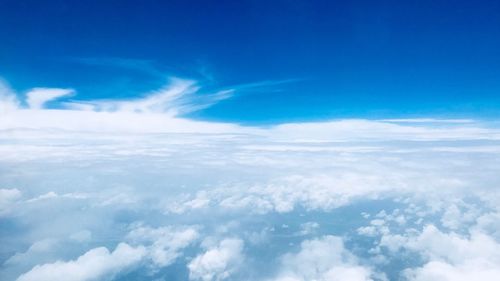 Aerial view of clouds over blue sky