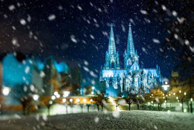 Cologne cathedral at night during snowfall