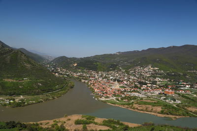 Aerial view of townscape against sky