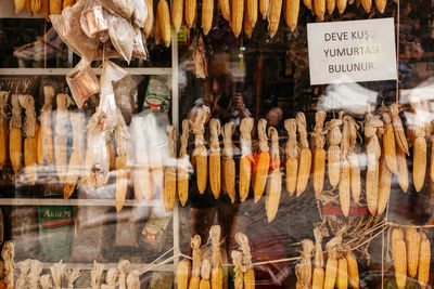 Corns with labels on window display at store