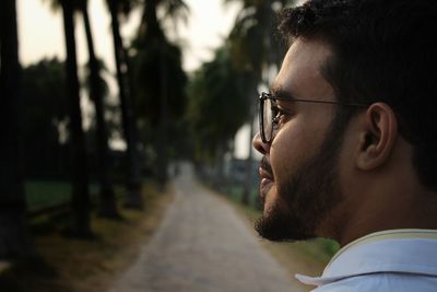 Portrait of young man looking away