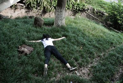 High angle view of young woman in park