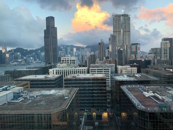 Modern buildings in city against sky