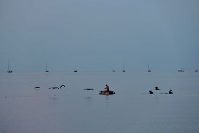 Scenic view of calm sea against clear sky