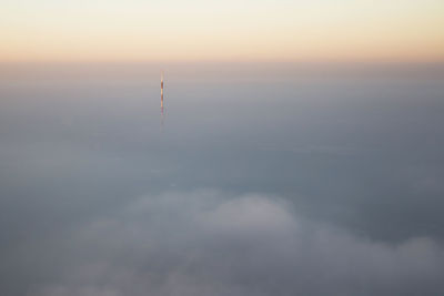 Scenic view of tower against sky during sunset