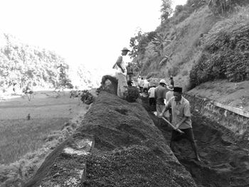 People walking on rocks