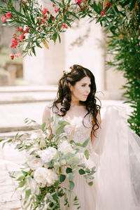 Portrait of woman with bouquet