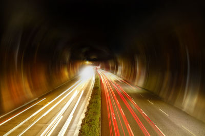 Light trails on road at night