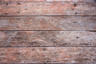 Full frame shot of weathered wooden floor