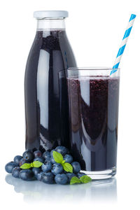 Close-up of drink against white background