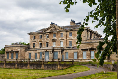 View of historical building against cloudy sky