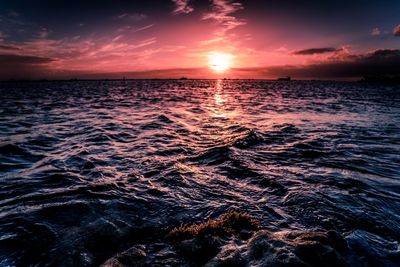 Scenic view of sea against sky during sunset