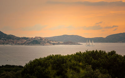 Scenic view of sea against sky during sunset