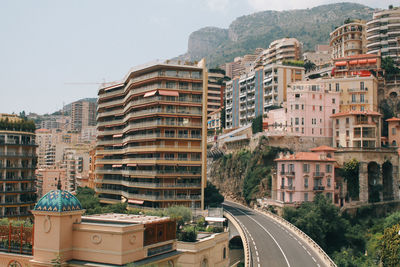 Buildings in city against sky