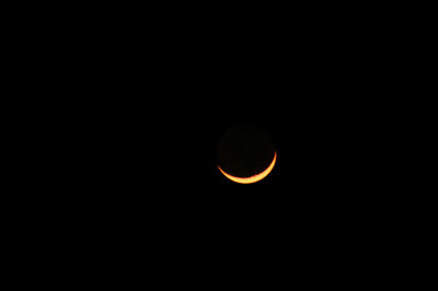 Scenic view of moon against sky at night