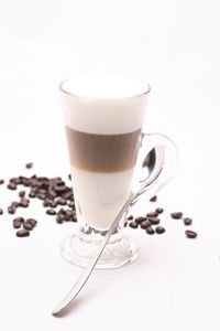 Close-up of coffee cup against white background