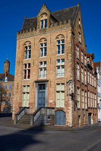 Low angle view of old building against sky