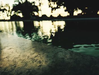 Surface level of lake at sunset