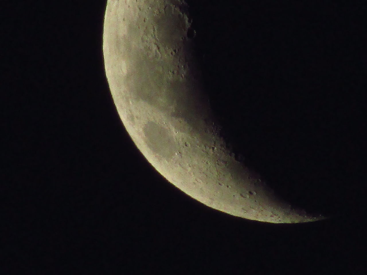 LOW ANGLE VIEW OF HALF MOON IN SKY