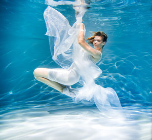 Portrait of woman under water