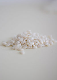 Close-up of coffee beans against white background