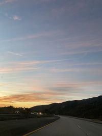 Road against sky during sunset