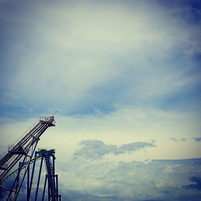 sky, cloud - sky, sea, built structure, cloudy, cloud, water, low angle view, crane - construction machinery, nature, development, outdoors, architecture, day, metal, no people, tranquility, travel destinations, scenics, beauty in nature