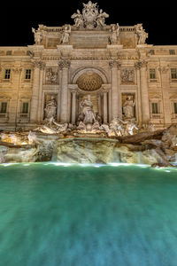 Fountain in front of historical building