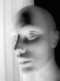 Close-up portrait of young man looking away