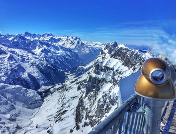 Scenic view of snowcapped mountains seen from observation point